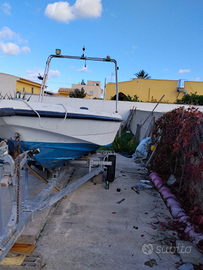 Barca 4,50 + motore 2T + carrello n.o