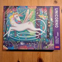 Unicorno libro e puzzle