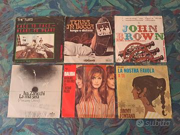 18 dischi 45 giri in blocco + 4