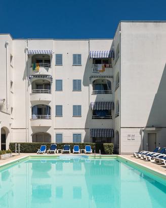 Appartamento con piscina vicino al mare