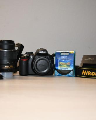 Nikon D3100 + 18-55 VR | 9.000 scatti | Accessori