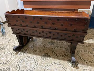 Culla a dondolo in legno