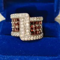 anello in argento con granati e zirconi