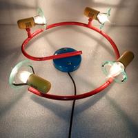 Lampadario rotondo con luci orientabili