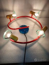 Lampadario rotondo con luci orientabili