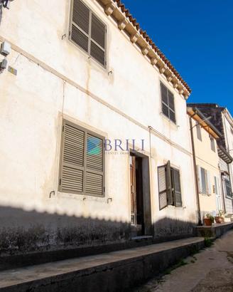 Palazzina terra-cielo da ristrutturare in centro L