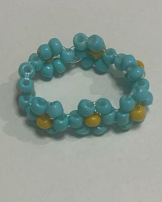 ANELLO AZZURRO E GIALLO FORMA  FIORI FATTO A MANO