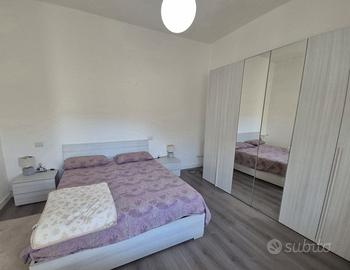 Camera matrimoniale con letto contenitore