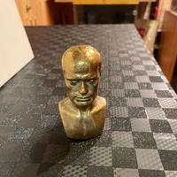 testa in ottone di mussolini
