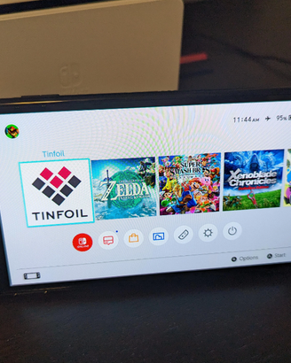 Nintendo Switch OLED + giochi