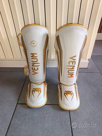 Paratibie Venum Elite bianchi e oro