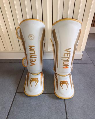 Paratibie Venum Elite bianchi e oro