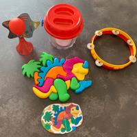 Puzzle dinosauro, tamburello, clacson per bici