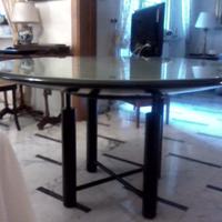 Tavolo tondo con piano in cristallo