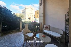 In Via Cesare Battisti app rifinito con cortile