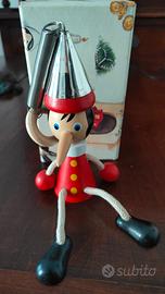 Pinocchio argento/legno