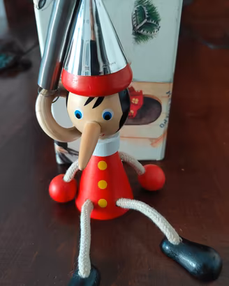 Pinocchio argento/legno