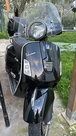 Vespa 125 con bauletto