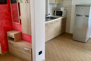 Monolocale arredato con posto auto