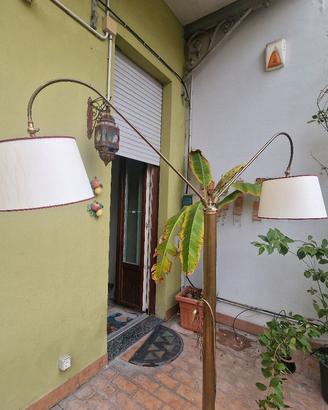 Lampada piantana a doppia luce