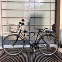 Bici uomo con seggiolino bambino