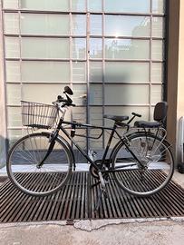 Bici uomo con seggiolino bambino