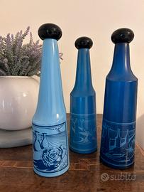 Bottiglie vintage rosso antico Salvador Dalì