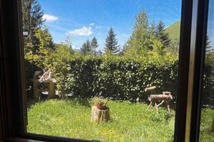 Bilocale con giardino e box