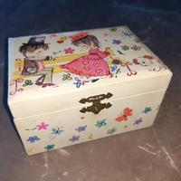 Scatoĺa portagioie con carillon ballerina