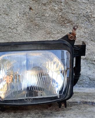 faro anteriore Dominator 