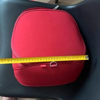 Zaino rosso Stokke con fasciatoio portatile