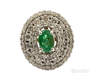 Anello oro bianco con smeraldo