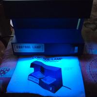 Rilevatore soldi falsi.