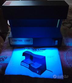 Rilevatore soldi falsi.