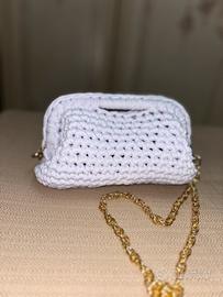 Clutch bag bianca con tracolla oro
