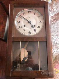 Orologio a pendolo da parete