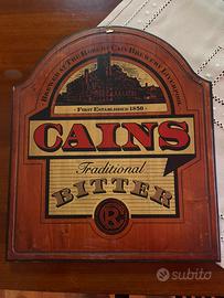 INSEGNA CAINS