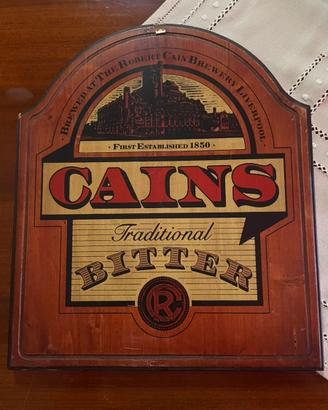 INSEGNA CAINS