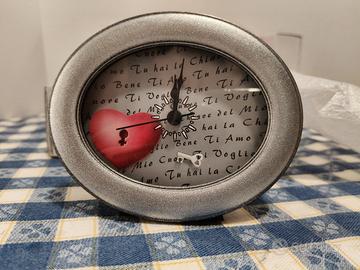 orologio ovale  da comodino 