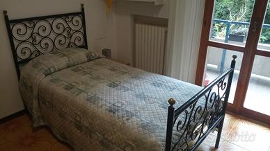 Letto in ferro battuto completo di rete e materass