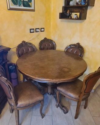 tavolo anni 80 con sedie  in pelle 