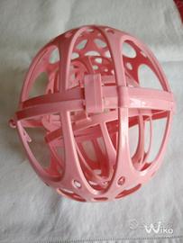 Due pentasfere rosa per lavatrice 