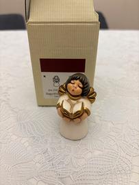 Thun, angioletto con libro, presepe classico