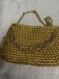 Pochette dorata Iziafattoamano