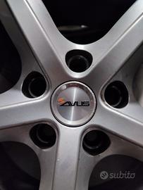  4 gomme da neve e 4  cerchi in lega 5 razze 