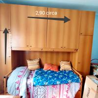 Armadio a ponte con letto 