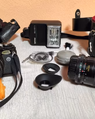 Fotocamera + accessori + spedizione inclusa
