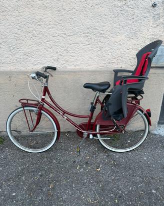 Bici da donna con seggiolone bambini