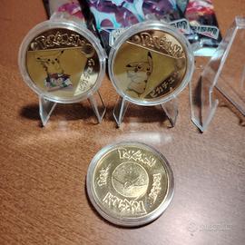 3 medaglie Pikachu più 10 bustine proxy 