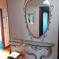 Consolle con specchio in ottone e cristallo